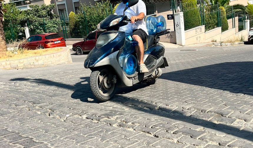 İzmir’de kuryeye sokak ortasında darp: O anlar kamerada